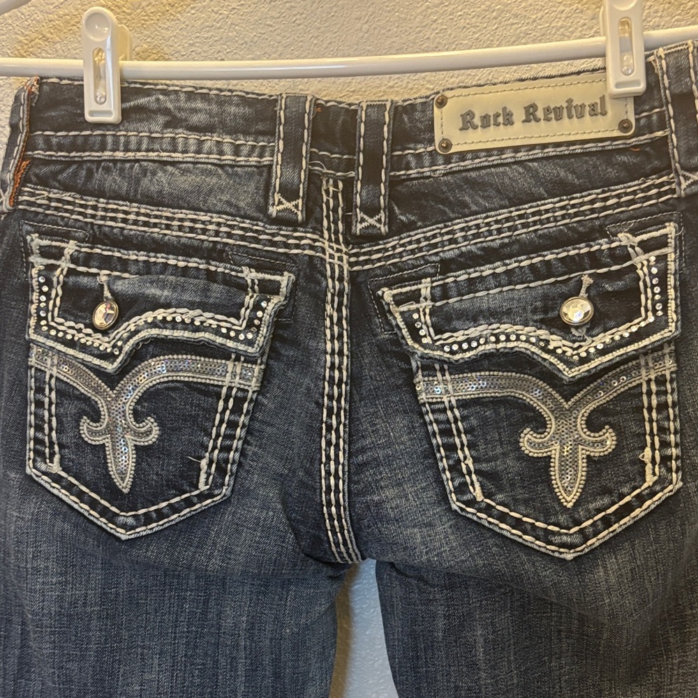 Rock Revival Women's Dark Blue Boot Cut Jeans with Rhinestone detail - Picture 3 of 12
